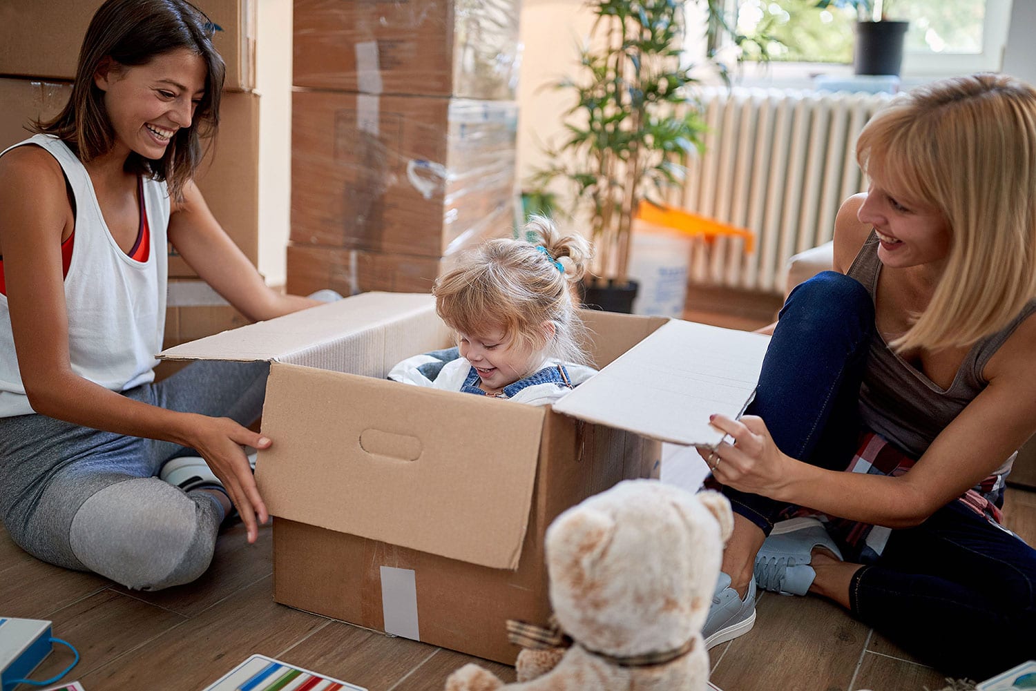 little girl in a cardboard box
