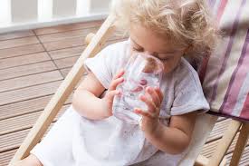 little girl drinking water